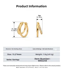 Detail view of double-layer 925 sterling silver hoop earrings with 18K gold and zircons