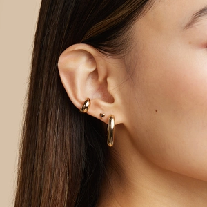 Three-piece gold plated S925 silver earring set with heart stud and polished hoop earrings