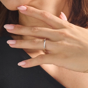 Minimalist 925 sterling silver ring in silver and gold dual-tone finish on finger
