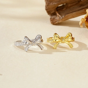 Bagues nœud papillon élégantes en argent S925 avec zircons en finitions or et argent