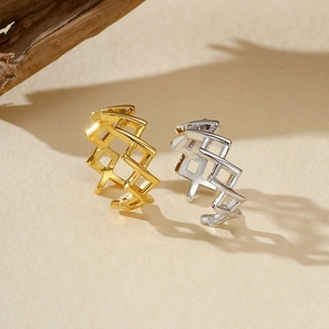Adjustable S925 sterling silver rings with geometric crisscross design in gold and silver