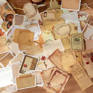 100-piece vintage collage paper pack with botanical and portrait art for scrapbooking