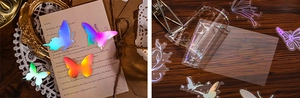 Détail macro d'autocollants papillons holographiques et cartes de décoration laser