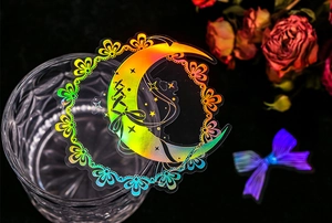 Détail macro d'autocollant lune holographique laser avec dentelle et rubans