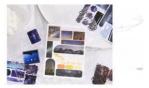 Detail of vintage starry sky galaxy stickers featuring nebula designs for journaling scrapbooks