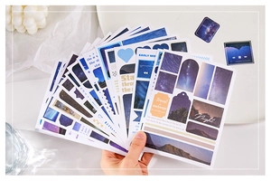 Detailed collage of starry night and universe theme stickers for journaling and stationery