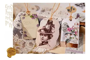 Set of three vintage floral and portrait decorative card tags with rustic twine strings