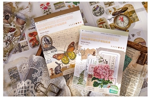 Detail of vintage sticker book showing 30 pages with 500+ floral and butterfly motifs