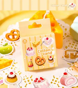 Makroaufnahme von Cotton Candy Dessert-Aufklebern auf Spitzenpapier mit Licht