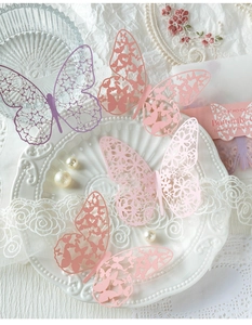 Lace hollow butterfly scrapbook paper featuring delicate laser-cut textures and pastel colors
