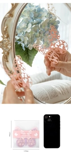 Detailed laser-cut hollow butterfly lace paper stickers shown in romantic mirror decor setting