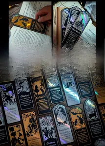 Detailed macro view of laser bronzing fairy tale bookmarks with hollow edges and rainbow texture