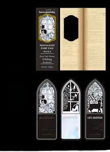 Macro detail of gothic arch silver bookmarks featuring black cat and vine patterns