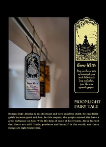 Macro view of Snow White metal bookmarks with Moonlight Fairy Tale silhouette engraving