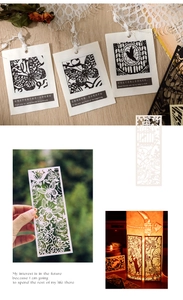 Detail of vintage laser-cut hollow bookmarks featuring butterfly and floral silhouettes