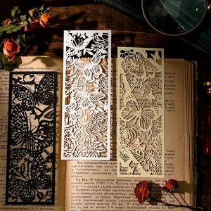 Vintage hollow silhouette bookmarks with butterfly and rose laser-cut paper patterns
