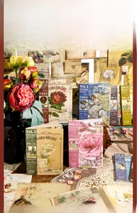 Detailed display of vintage floral scrapbook paper set with double-sided oil painting prints