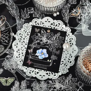 Vintage PET stickers with black line art, butterflies and blue flowers on lace