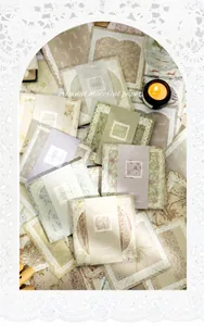 Λεπτομέρεια από vintage χαρτί scrapbooking με σχέδια φυτών, δαντέλα και φως κεριών