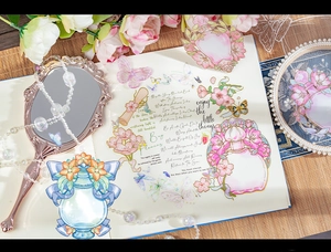 Detail of floral PET stickers with gold foil accents on a journal layout