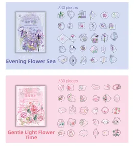 Close-up of vintage floral PET stickers in purple and pink themes for journaling