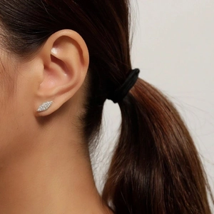 Elegant S925 sterling silver triangle stud earrings with pave diamond inlay on model