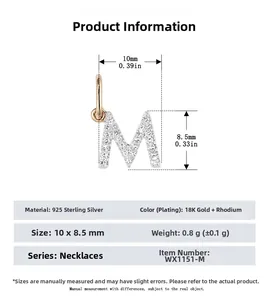 Detail of S925 sterling silver letter M pendant with zircon stones and 10x8.5mm dimensions