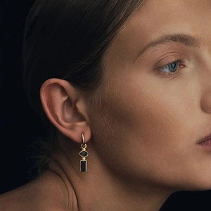 Elegant gold-plated S925 sterling silver drop earrings with black gemstone accents