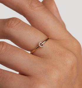 Detailed view of a slender gold S925 silver ring featuring a sparkling pavé diamond circle