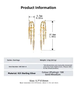Detail of 925 sterling silver drop earrings with triple tassel crystal rows and 18K gold finish