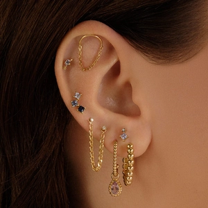 Golden S925 sterling silver ear cuff set with blue square rhinestones and heart stud
