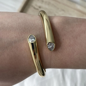 Elegant S925 sterling silver open bangle featuring pear-cut zircon teardrop accents in gold