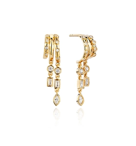 Close-up of gold layered earrings with mixed-cut cubic zirconia drop details