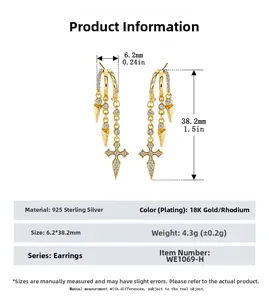 Macro view of S925 sterling silver tassel earrings with zircon and cross details