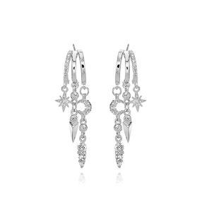 Macro detail of S925 silver stud earrings with cascading stars and moon zircon charms