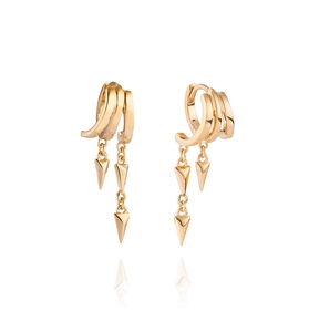 Detail of gold-plated punk style triple ring earrings with hanging metal spiked studs