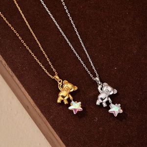 S925 Sterling Silver necklace featuring 3D teddy bear and holographic star pendants