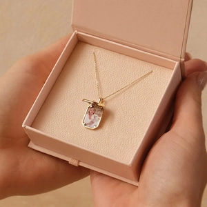 Octagon photo locket necklace in gold finish featuring a customizable picture pendant