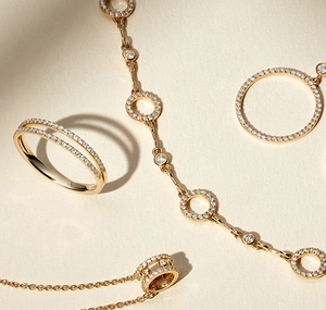 Exquisite gold-plated jewelry set featuring double-row diamond ring and round hollow necklace