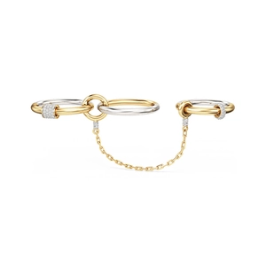 Detail of multi-link rings in gold and silver with pavé-set diamonds and link chains