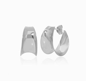 Close-up of geometric S925 sterling silver C-shape stud earrings with a wavy metal texture