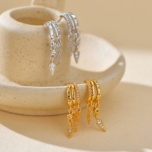 S925 silver layered stud earrings with micro-pave zircons and dangling arrow tassels