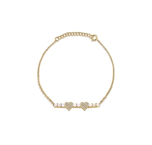 Detail of 18K gold S925 silver bracelet with pavé diamond hearts and opal stones