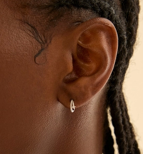 Close-up of S925 sterling silver hoop earrings featuring small inlaid square zircons