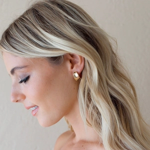 Polished S925 sterling silver chunky C-shape hoop earrings on a fashion model