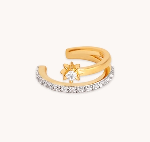 Detailed close-up of double-layer gold ear cuff with zircons and north star motif
