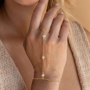 Elegante bracciale anello schiava in argento S925 dorato con tre zirconi rotondi