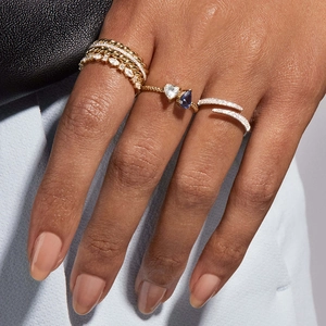 Elegant S925 silver wheat ear rings stacked with sapphire and zircon on model's hand