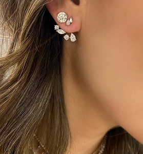 Close-up of S925 silver ear jacket earrings with marquise and pear-cut cubic zirconia