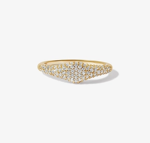 Macro shot of gold-plated pavé band ring with sparkling cubic zirconia in high detail